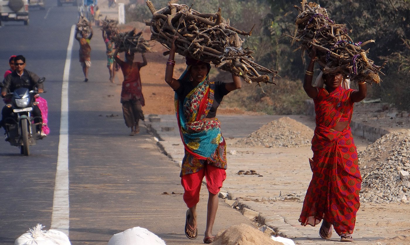 Women carrying woods