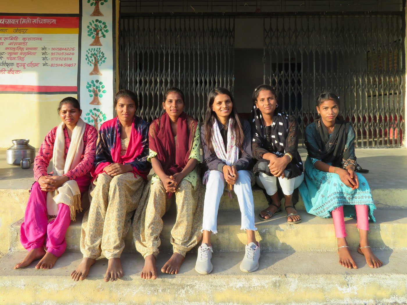 Menka (wearing blue jeans) with girls from surrounding villages who come for the counselling every Saturday afternoon