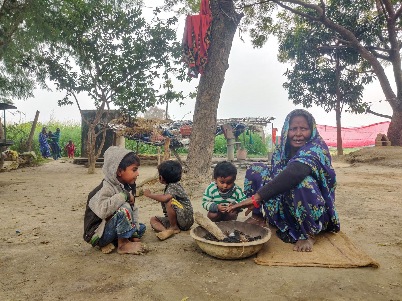 Kalavati with her great-grandchildren at home in Dallipur. Her daughter-in-law Shanti died of Covid-like symptoms in April 2021