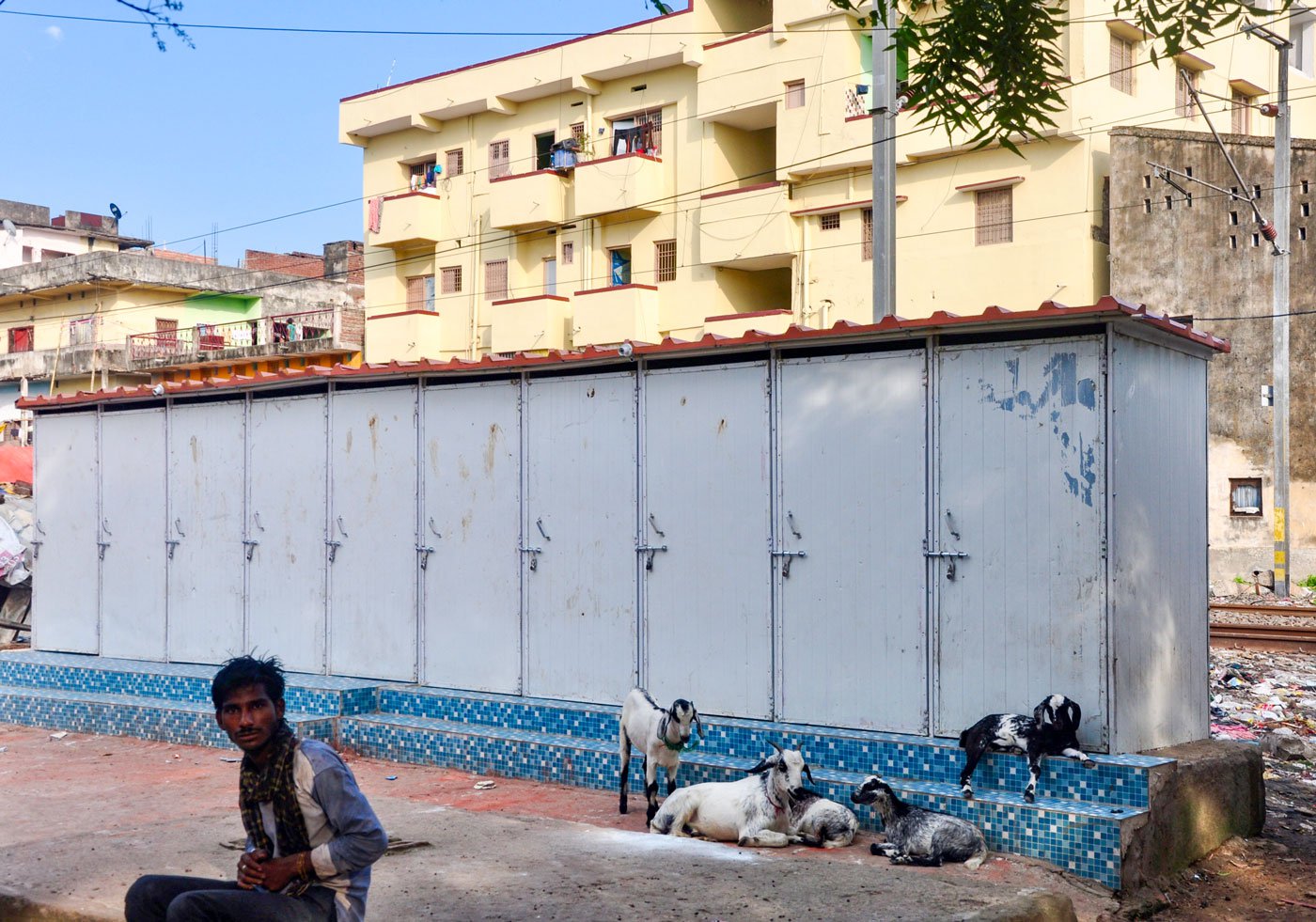 A public toilet block – the only one in this colony – stands unused, its handover to the community delayed by the pandemic