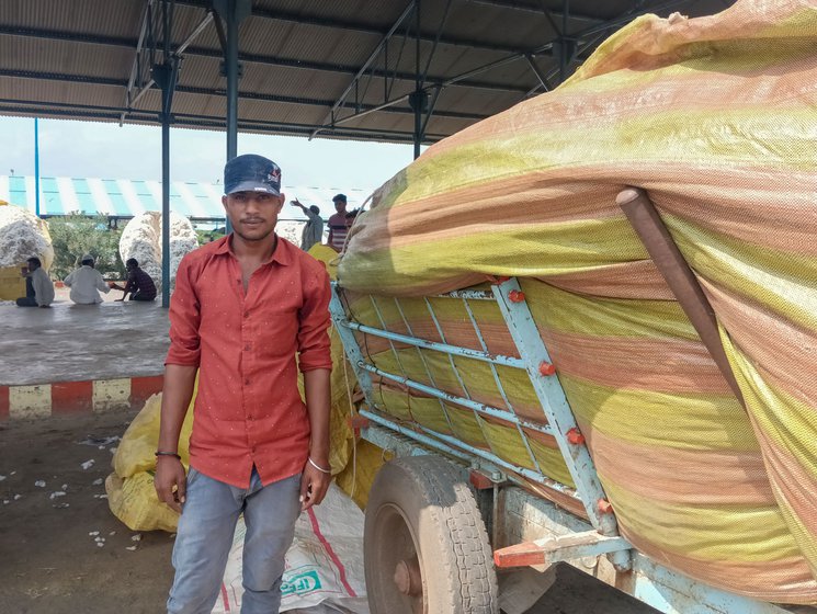 Sanjay Yadav (left) is a cotton farmer in Navalpura village in Khargone district.