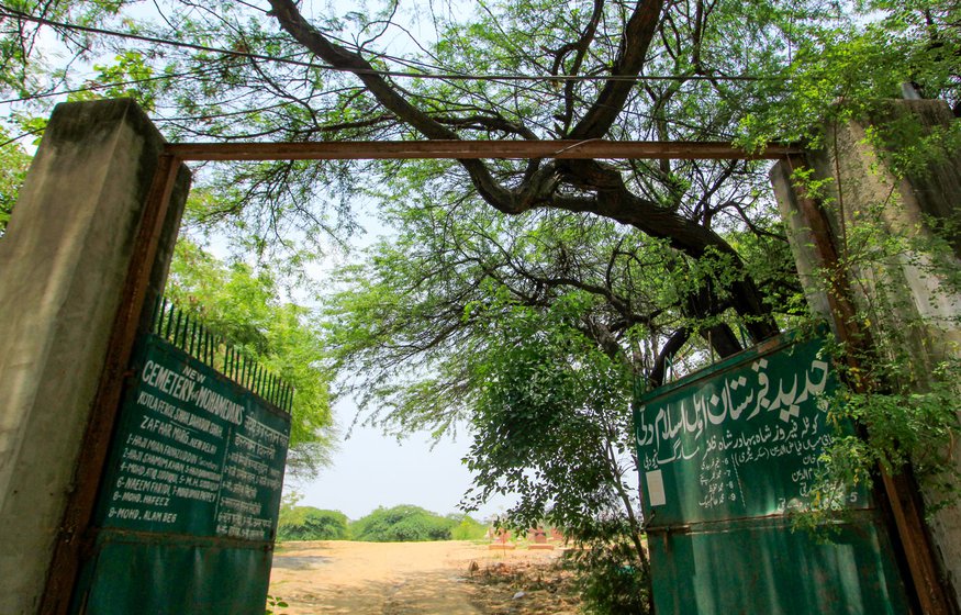 Left: One of the gates to the qabristan; on this side only those who died of Covid are buried. Right: Nizam Akhtar writing the names of the deceased on gravestones