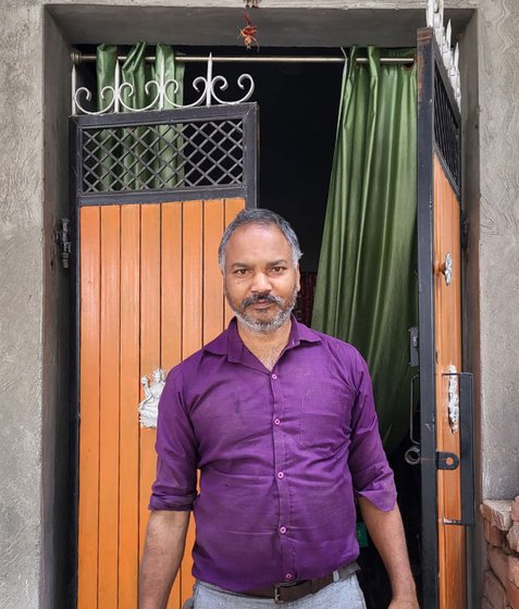 Right: Ram's uncle Motilal standing outside their house in Sonipat, Haryana