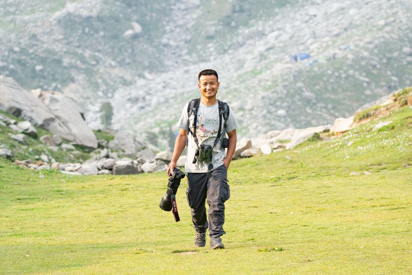 Seen here (right) with his friend’s Canon 80D camera and 150-600mm Sigma lens in Triund, Himachal Pradesh