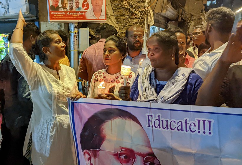 Right: Vennila (white kurta) plays a lead role in gathering women for the rally