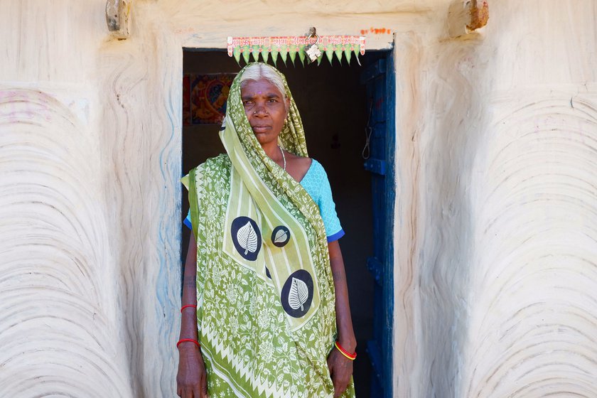 In the area known as Naditola, Geeta lives with her large family of seven and Sakuni with her youngest son (right) Akendar Oraon