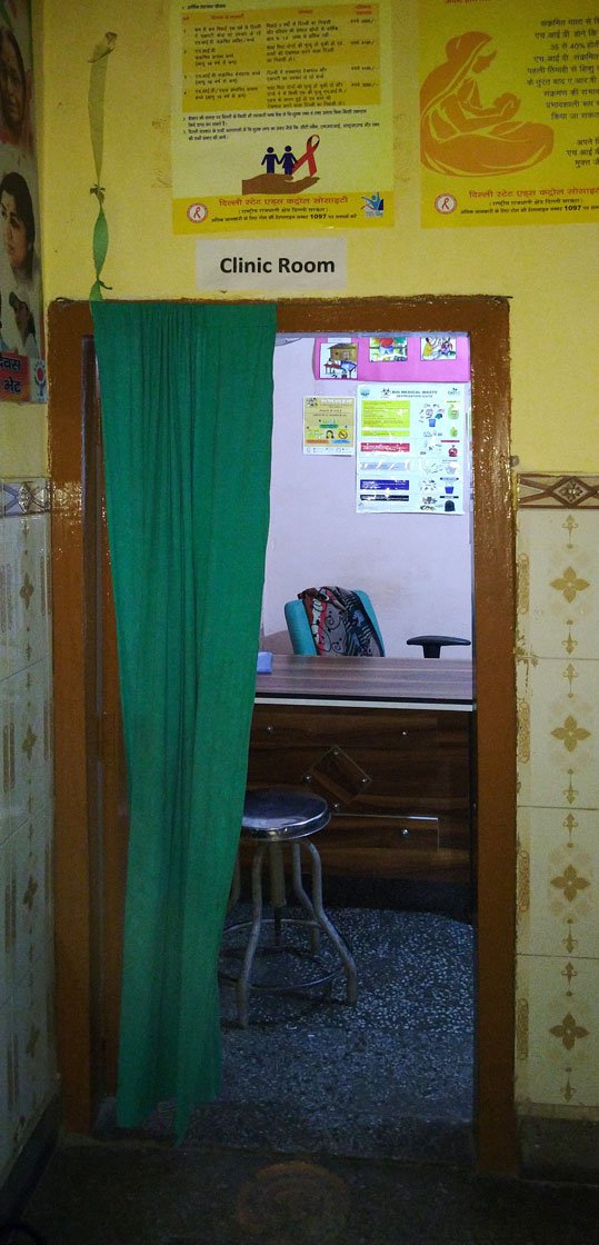 A room at the office of an NGO, where a visiting doctor gives sex workers medical advice and information about safe sex practices