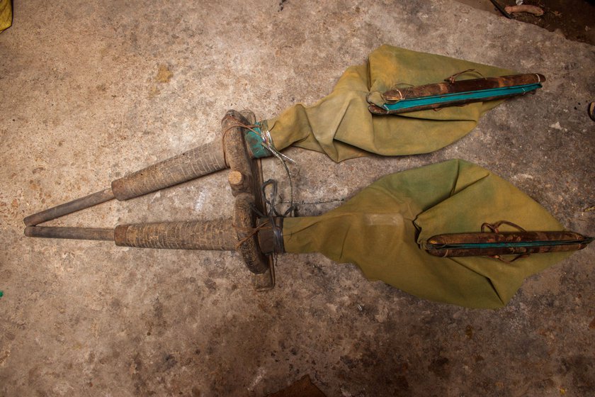 Mohanlal’s family uses a traditional blacksmith forge called dhaman (left) to shape metals . The dhaman is 'at least 100 years old and works perfectly,' he says. With rising temperature, the forge produces a lot of smoke (right), which causes breathing and coughing problems, says Mohanlal