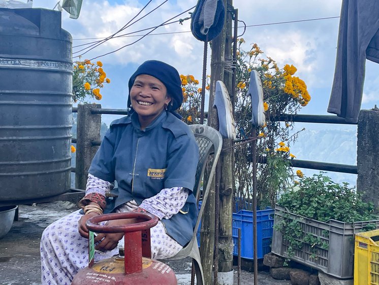 Left: Maya Thami rests after delivering a cylinder.