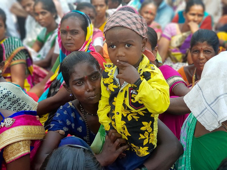 A katakari woman participated in march with her child