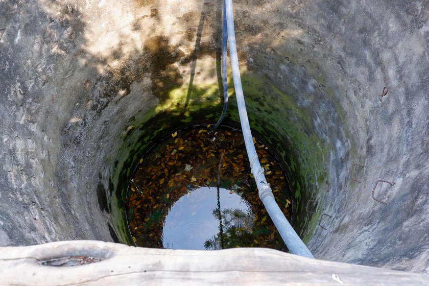 Left and Right: Lakhan Ram, Savita’s father-in-law, next to the well which has dried up. Checharia has been facing a water crisis for more than a decade