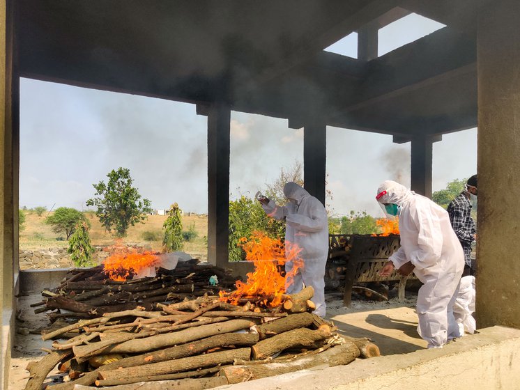 Family members sometimes skip a deceased relative's funeral out of fear of the virus; they ask municipal workers to conduct the basic cremation rituals