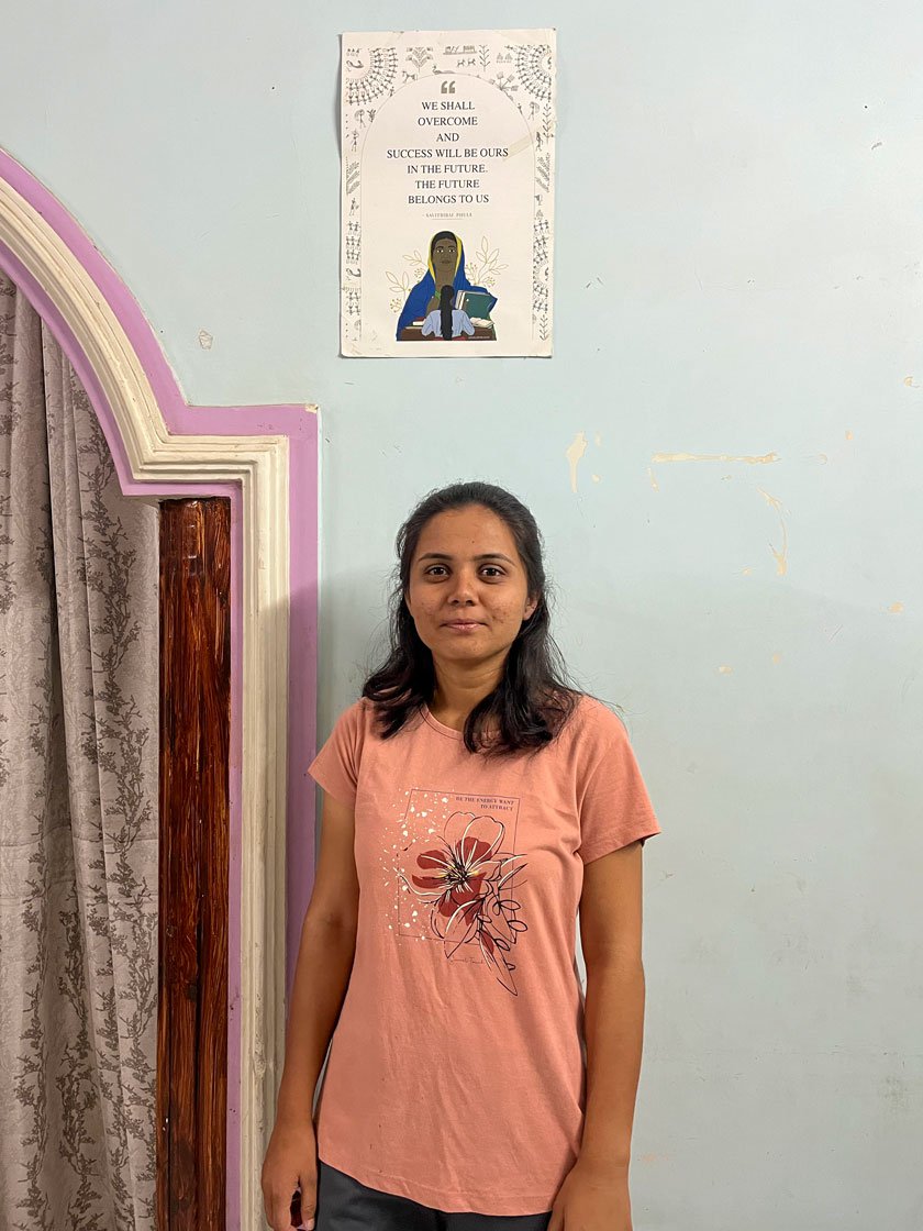 Asha in her college library (left). She has been inspired by the struggle of Savitribai Phule for women's right to education