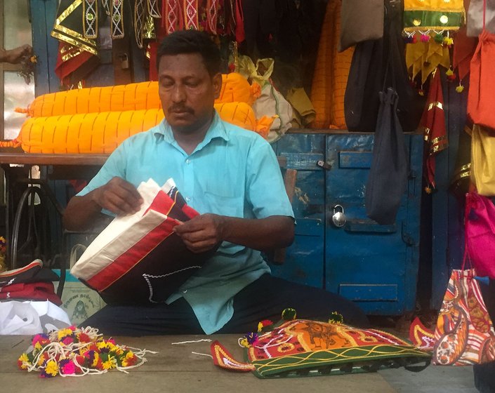 Amir John at his shop