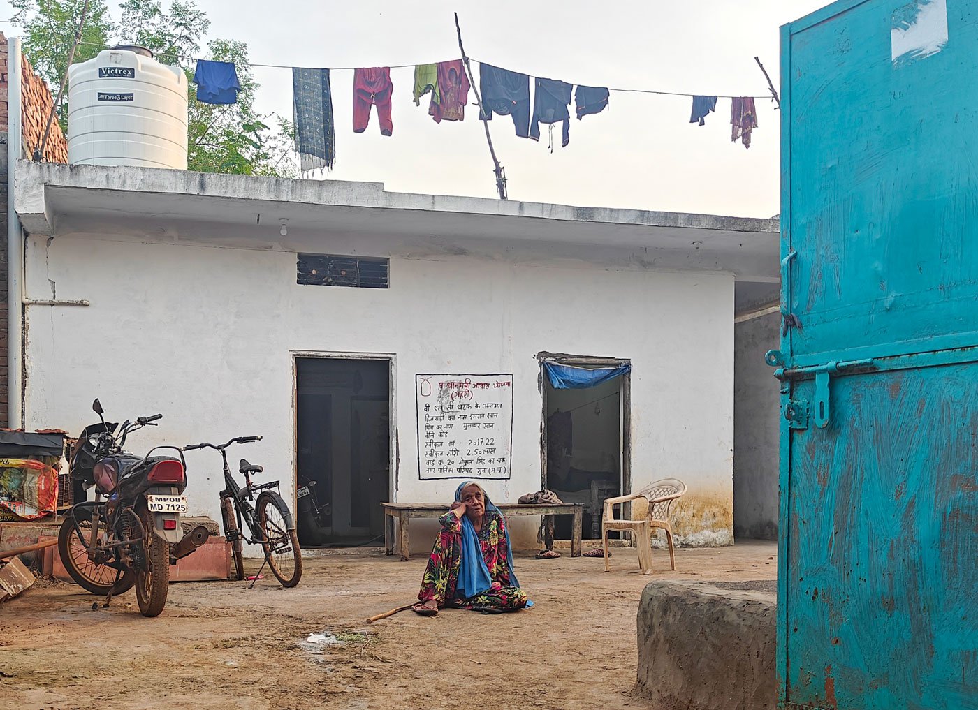 Intaaz Bai, Israel’s grandmother in front of their home in Gokul Singh Ka Chak, a basti in Guna district