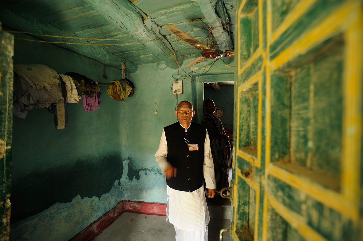 Man standing in his house