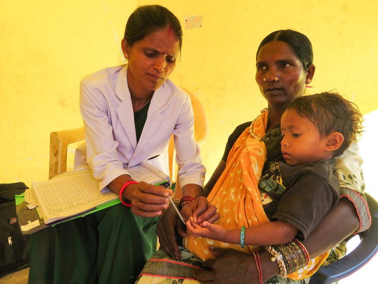 Savitri pricking Suhani’s finger for the malaria test. Right: Manki, Savitri and Bejni giving bitter malaria pills to Suhani