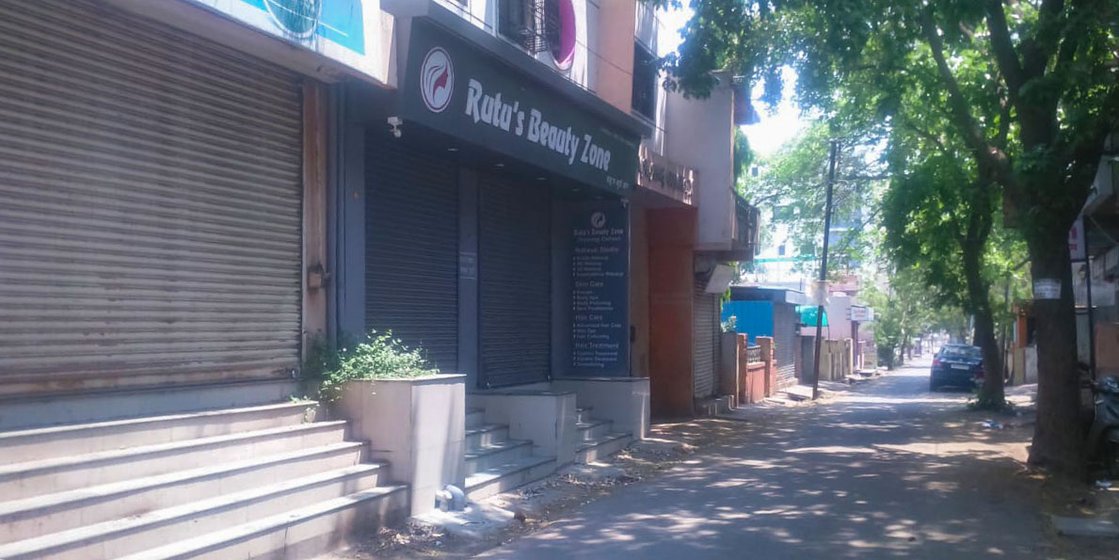 Left: Rutu’s Beauty Zone is one of many salons in Latur city Right: Deserted main thoroughfare of Latur city

