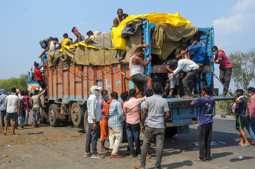 Millions of migrants walked long distances to return home during the lockdown; some came by trucks or other vehicles as there was no public transport

