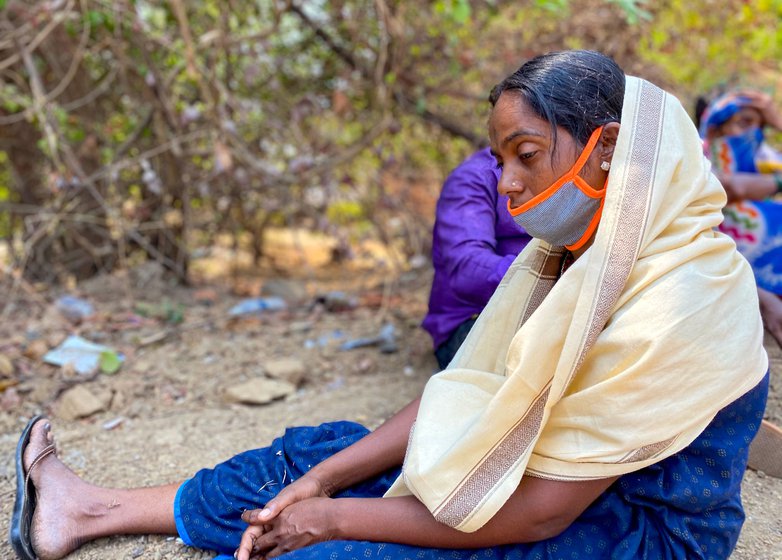 Mangesh Pagi’s parents mourn the loss of their son outside ReVera Hospital while his wife, Mina (right) sits stunned