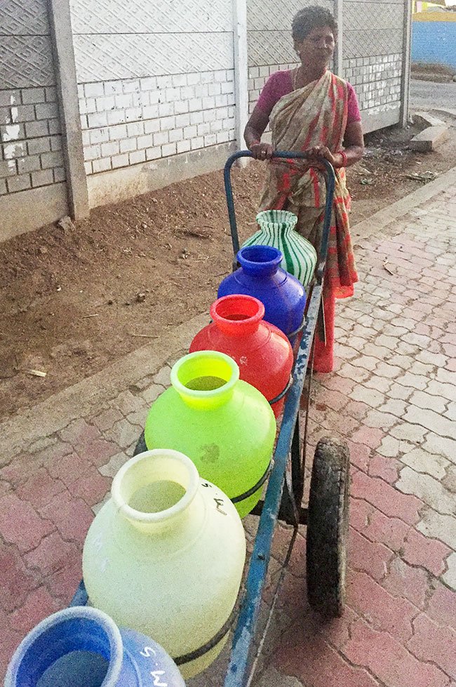 Akila, a villager with the trolley