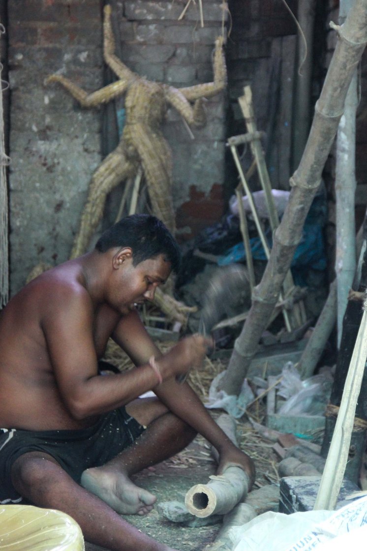 The process of making an idol starts with the 'kathamo', a bamboo structure to support the idol. 