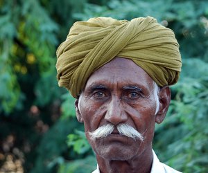 Man with a colourful headgear