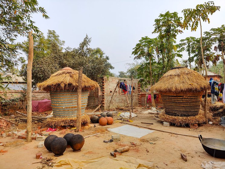 Left: Earthen jars used to brew their traditional liquor, Hanriya.