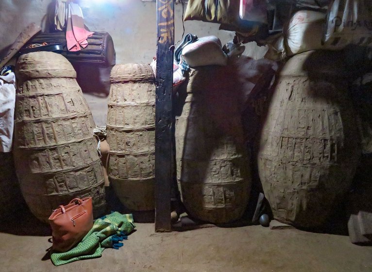 In one corner of Malu Wagh's hut, paddy is stored amid neem leaves in a kanagi: 'That’s the most precious thing in the house now'

