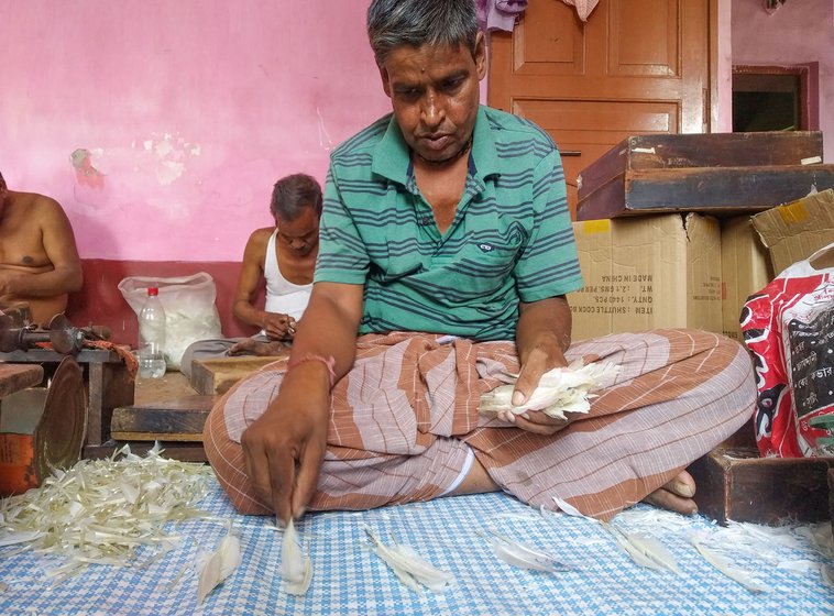 Left: Shankar Bera is sorting feathers into grades one to six. A shuttle is made of 16 feathers, all of which should be from the same wing-side of ducks, have similar shaft strength, thickness of vanes, and curvature.