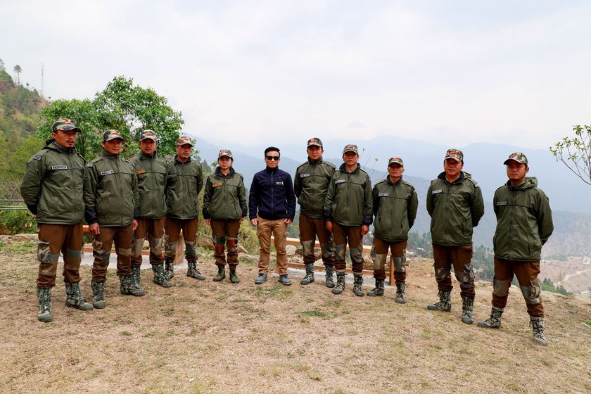 Patrolling officers seen here with District Forest Officer Milo Tasser (centre) who played a crucial role in establishing the community forest reserve.