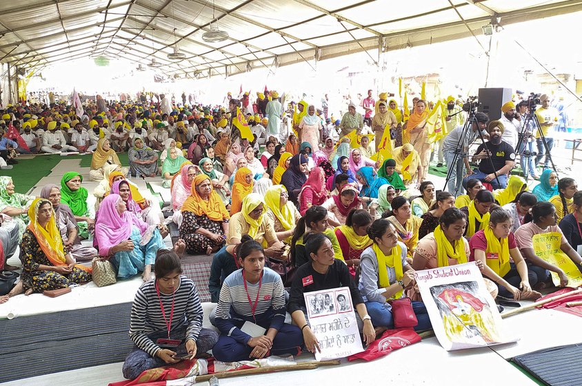 All eyes watched in anticipation as eight young men climbed onto the stage of the Samyukta Kisan Morcha at Singhu carrying the earthen pots on their heads