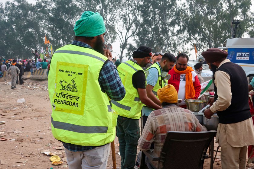 Right: A ppointed volunteers act as guards or Pehredars of the farmer unions keep a check on miscreants