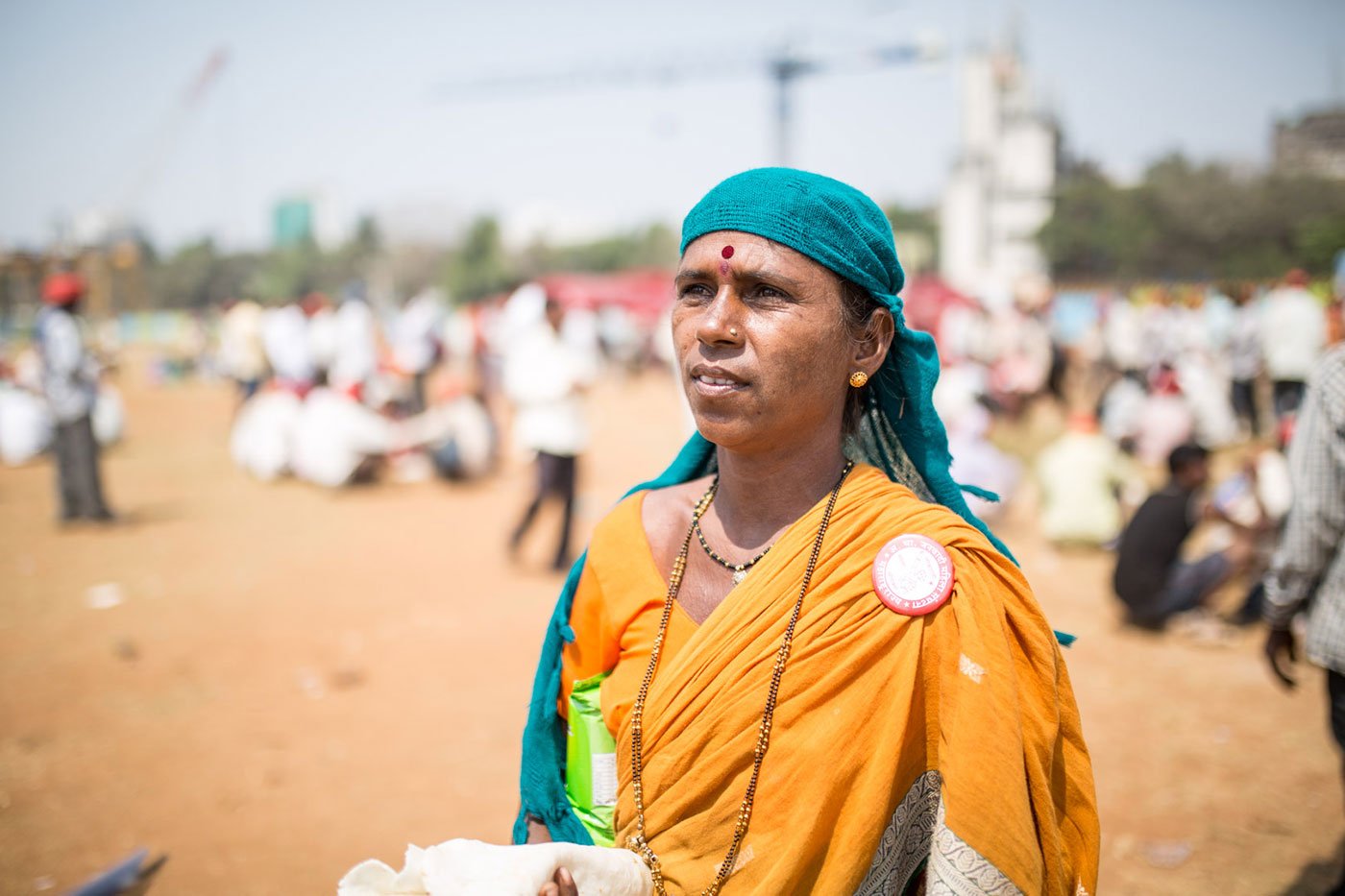 A woman standing at Azad Maidan