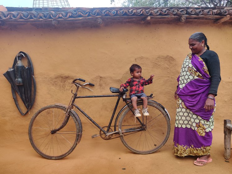 Salimun with Gufran, her grandson