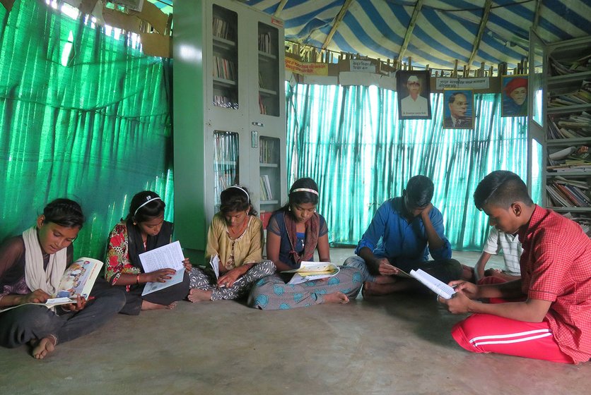 Students reading in the library