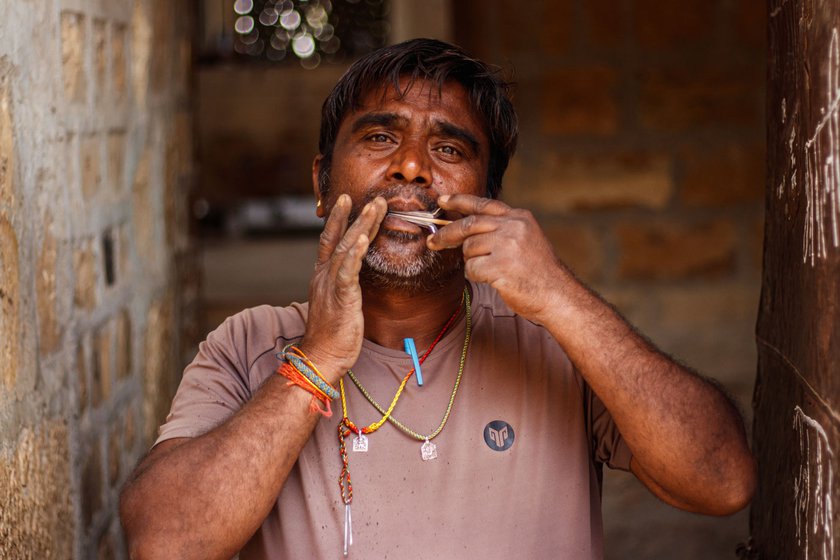 Left: Ranmal, Mohanlal's elder son and a sixth generation lohar, playing the instrument . 'Many people have started using machines for hammering, but we do it using our bare hands even today,' he says.