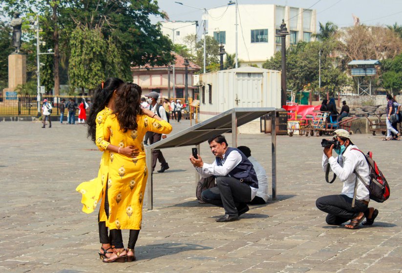 To try and compete with smartphones, some photographers carry a USB devise to transfer the photos from their camera to the customer’s phone