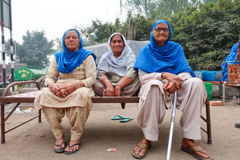 Right: Harbhajan Kaur (right) has travelled for two days to reach Shambhu. 'My son did not want to bring me here but I persisted,' she says