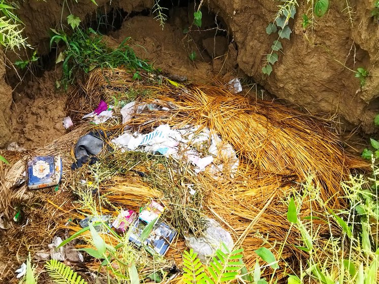 The Parvin river (left) flows through the village of Jhankat and the area around (right) is littered with pads and other garbage