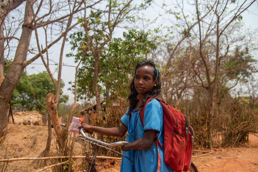 It is 1 p.m. and Jhilli Dehuri, a Class 7 student and her schoolmate, are pushing their cycles home to Barabanki. She is often sick from the long and tiring journey, and so is not able to attend school regularly