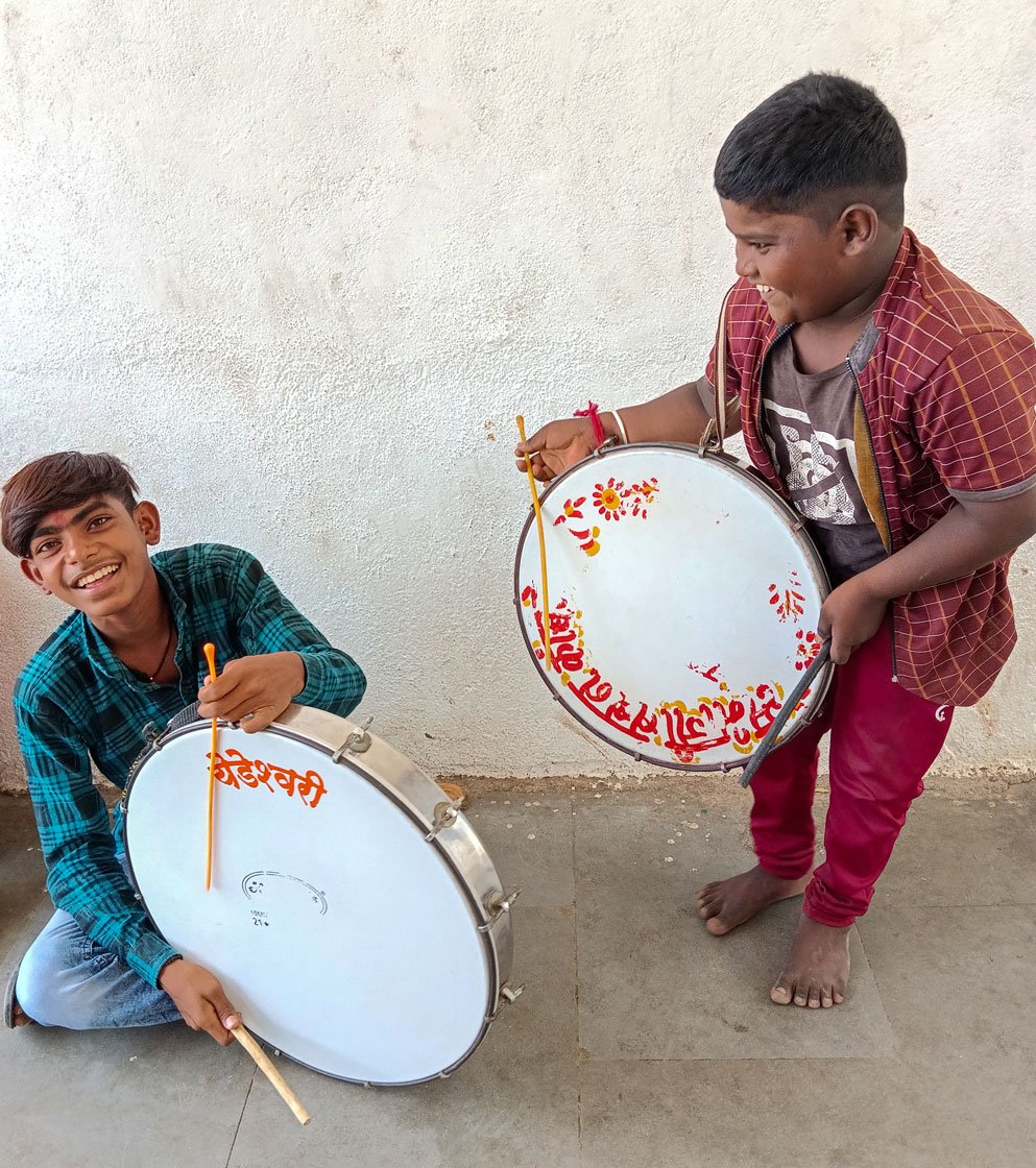 Right: Shriram Kamble (sitting on the floor) and his friend who did not want to share his name enjoying their time out