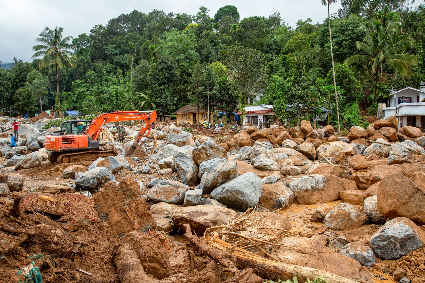 Rocks and soil buried many houses