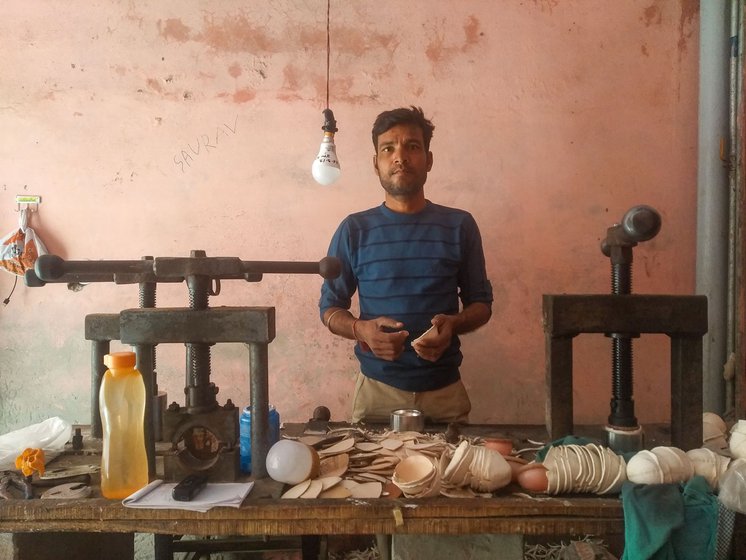 Right: Vikramjeet reinforces the inside of the hemispheres with thinner, oval pieces, a process known as astar lagana . The machine on his right is used for seam-pressing, and the one on his left is the golai (rounding) machine