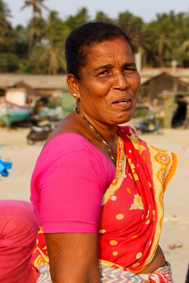 Left: Manisha Jadhav, head of the local fisherwomen’s association, Sindhusagar Macchi Vikri Mahila Sanghatna, Malwan, exudes confidence as she sits with her fish in the market. Right: Women of the community

