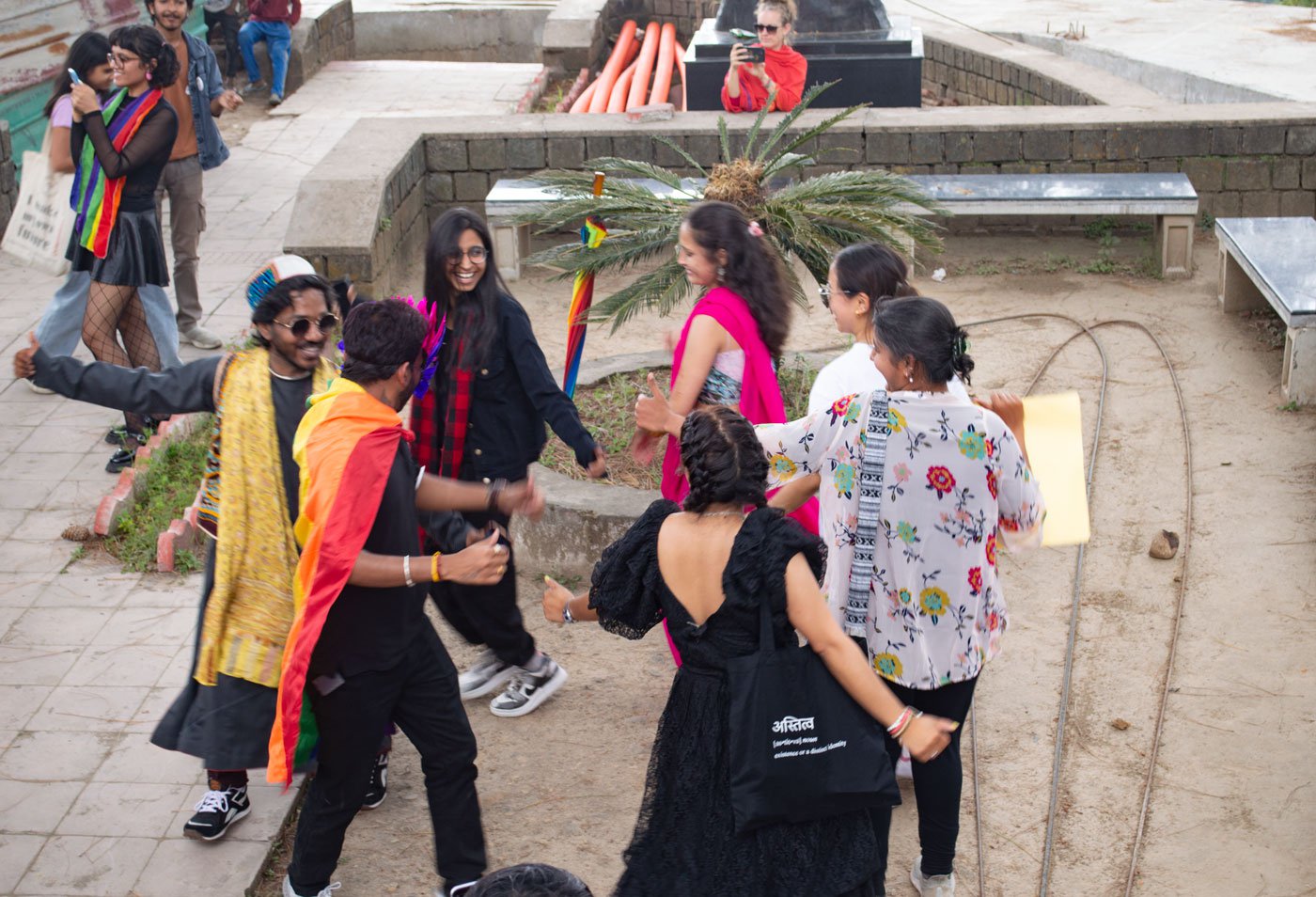 The participants of the Pride march stop to dance