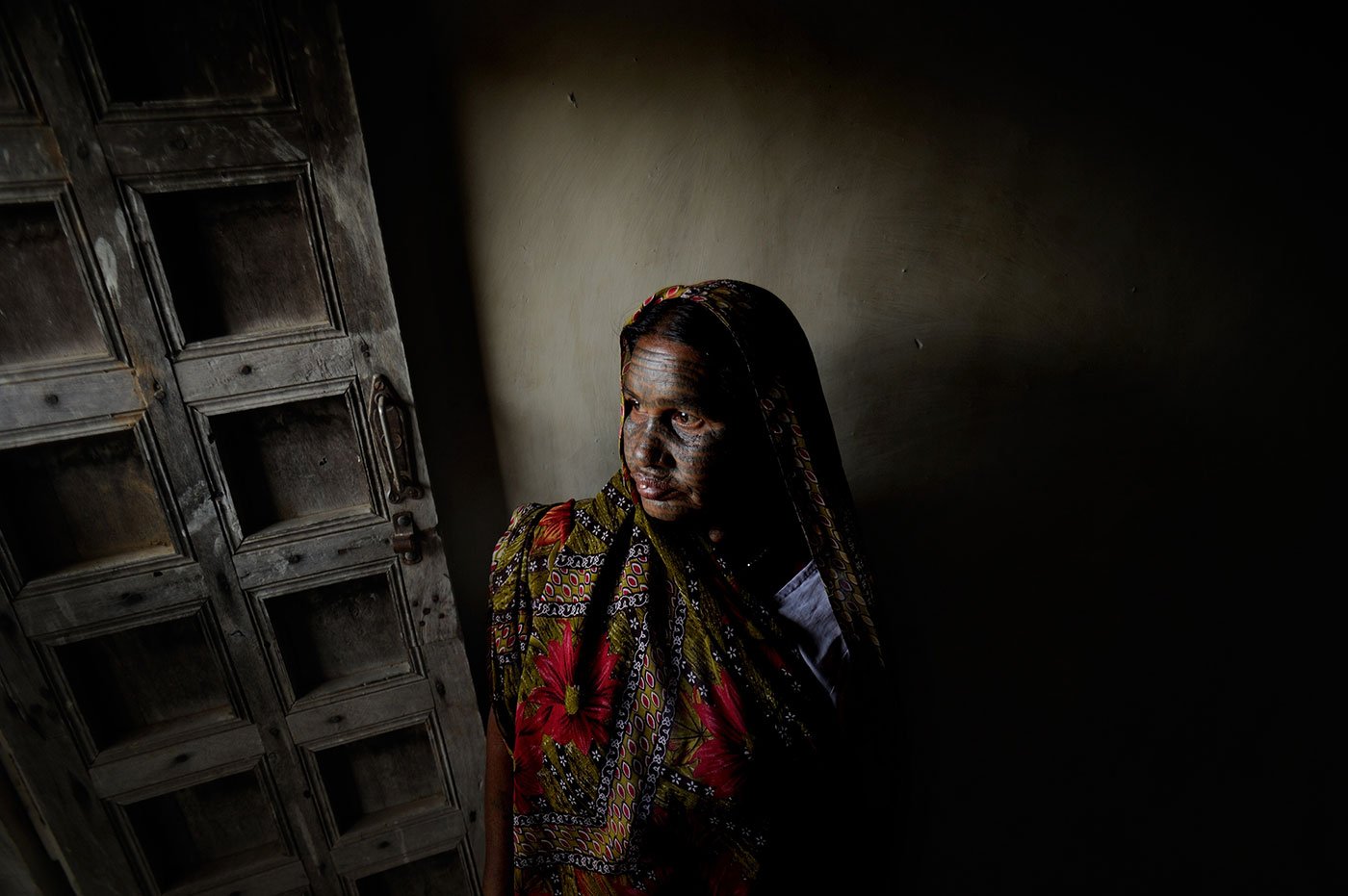 A woman standing in a doorway