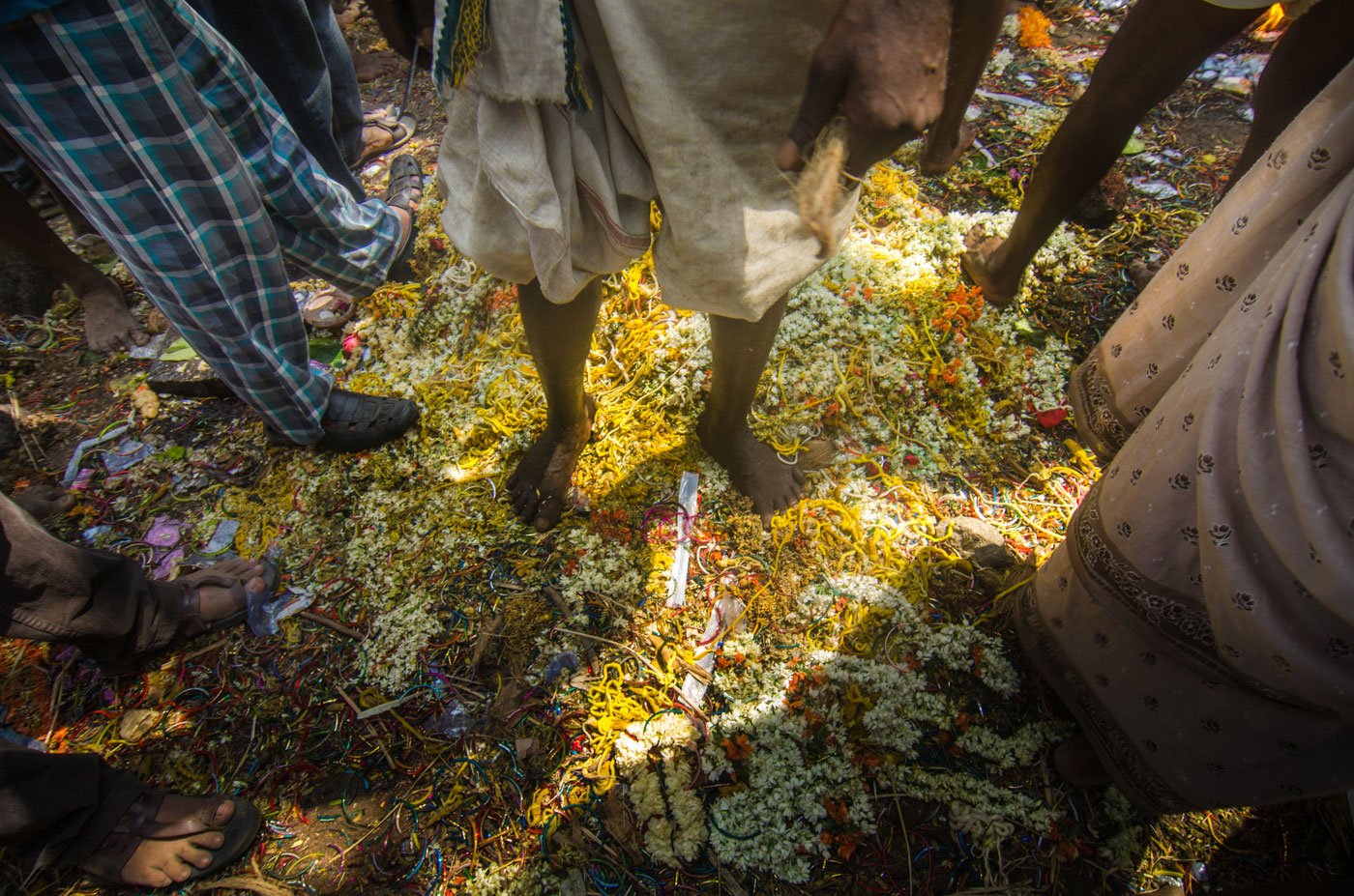 Near the temple are the remnants of what used to be signs of marriage – scattered garlands, broken bangles and cut up thalis