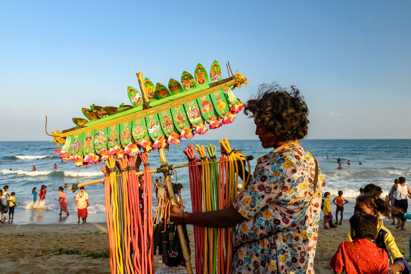 A vendor selling catapults used by the Irulars for hunting birds