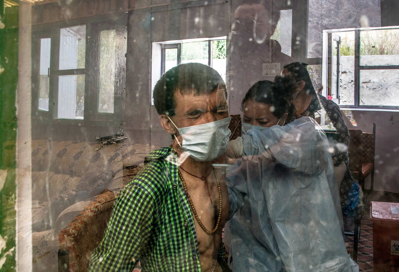 A villager from the Lamayuru area getting his second dose at the PHC in Khaltse village